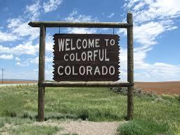 Sign that reads, "Welcome to Colorful Colorado"